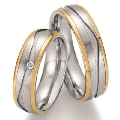 Vielsesringe i stål / guld  (08/25)