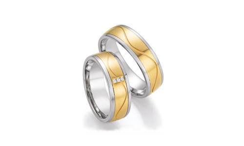 Vielsesringe i stål og guld   (04/25)